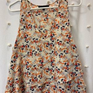 Sanctuary brand flowy tank, size L. pet and smoke free home